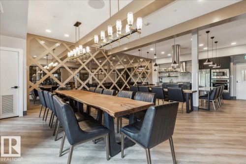 OWNER AMENITY - FULLY EQUIPPED CHEFS KITCHEN AVAILABLE FOR PRIVATE OWNER RESERVATIONS - 405 7463 May Common, Edmonton, AB - Indoor Photo Showing Dining Room