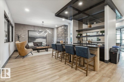 OWNER AMENITY - FOR CASUAL USE OR FOR OWNERS TO BOOK PRIVATE FUNCTIONS. 2 FIREPLACES, 2 BARS WITH  FRIDGES, RAVINE VIEWS - 405 7463 May Common, Edmonton, AB - Indoor