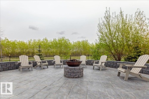 OWNER AMENITY - GAS FIREPIT ADJACENT TO THE WHITEMUD RAVINE / MACTAGGART SANCTUARY - 405 7463 May Common, Edmonton, AB - Outdoor With Deck Patio Veranda