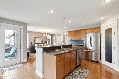 12067 21 Avenue, Edmonton, AB - Indoor Photo Showing Kitchen With Double Sink