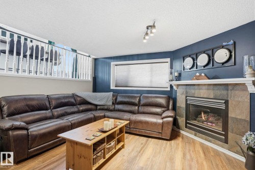 5410 57 Avenue, Beaumont, AB - Indoor Photo Showing Living Room With Fireplace