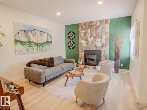 3412 110 Street, Edmonton, AB - Indoor Photo Showing Living Room With Fireplace