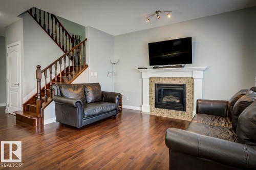 1924 69 Street, Edmonton, AB - Indoor Photo Showing Living Room With Fireplace