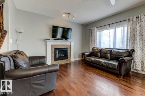 1924 69 Street, Edmonton, AB - Indoor Photo Showing Living Room With Fireplace