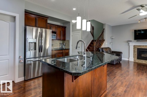 1924 69 Street, Edmonton, AB - Indoor Photo Showing Kitchen With Fireplace With Double Sink