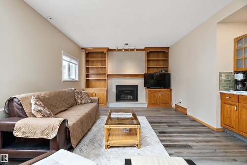 229 Northmount Drive, Wetaskiwin, AB - Indoor Photo Showing Living Room With Fireplace