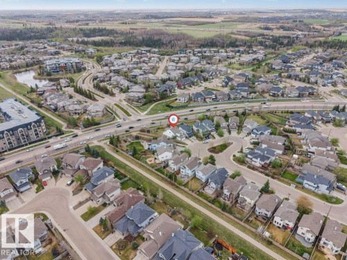 Aerial perspective showcasing a residential neighborhood with varied housing styles - 7403 Singer Landing Landing, Edmonton, AB - Outdoor With View