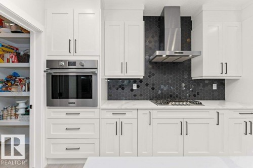 1390 Enright Landing Landing, Edmonton, AB - Indoor Photo Showing Kitchen