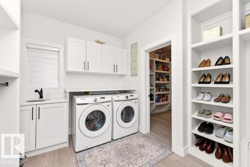 1390 Enright Landing Landing, Edmonton, AB - Indoor Photo Showing Laundry Room