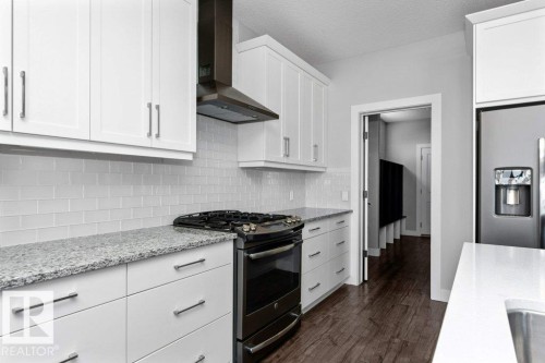62 Ellice Bend, Fort Saskatchewan, AB - Indoor Photo Showing Kitchen With Upgraded Kitchen
