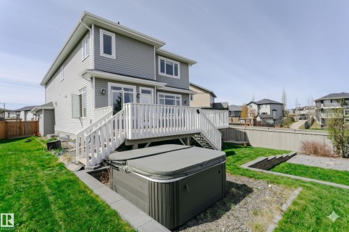 Multi-level exterior with light gray siding and white trim - 62 Ellice Bend, Fort Saskatchewan, AB - Outdoor With Deck Patio Veranda