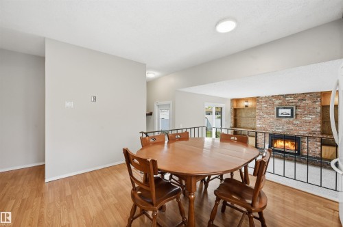 692 Lee Ridge Road, Edmonton, AB - Indoor Photo Showing Dining Room With Fireplace