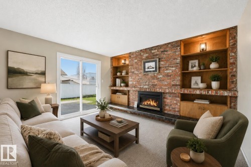 Virtually Staged - 692 Lee Ridge Road, Edmonton, AB - Indoor Photo Showing Living Room With Fireplace