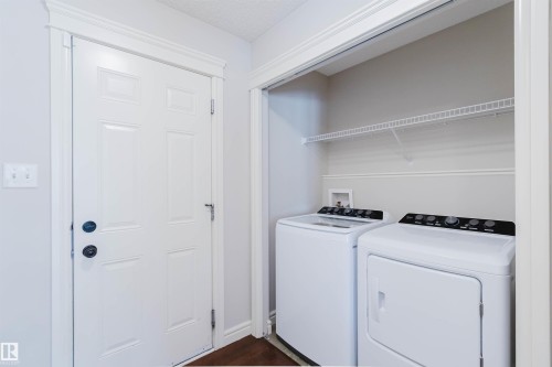 Dedicated laundry area featuring a wire shelf and connections for appliances - 1140 115 Street, Edmonton, AB - Indoor Photo Showing Laundry Room