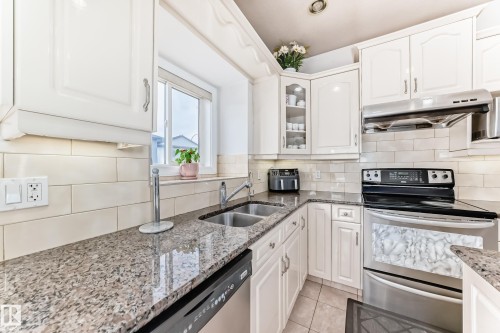 16626 58A Street, Edmonton, AB - Indoor Photo Showing Kitchen With Double Sink With Upgraded Kitchen