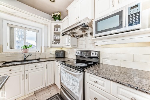 16626 58A Street, Edmonton, AB - Indoor Photo Showing Kitchen With Double Sink