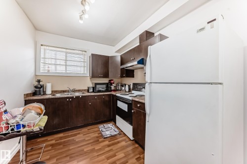 16626 58A Street, Edmonton, AB - Indoor Photo Showing Kitchen With Double Sink