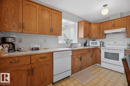 3516 37 Street, Edmonton, AB - Indoor Photo Showing Kitchen With Double Sink