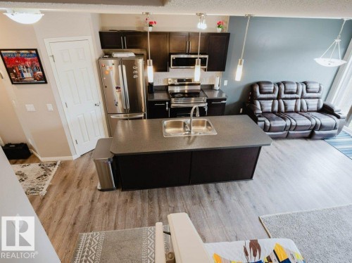 7607 24 Avenue, Edmonton, AB - Indoor Photo Showing Kitchen With Double Sink