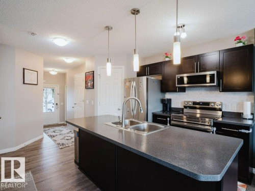 7607 24 Avenue, Edmonton, AB - Indoor Photo Showing Kitchen With Double Sink With Upgraded Kitchen