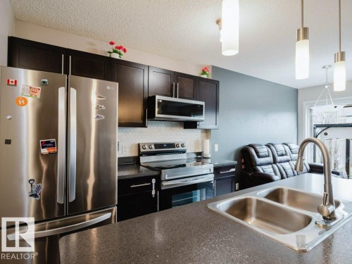 7607 24 Avenue, Edmonton, AB - Indoor Photo Showing Kitchen With Double Sink With Upgraded Kitchen