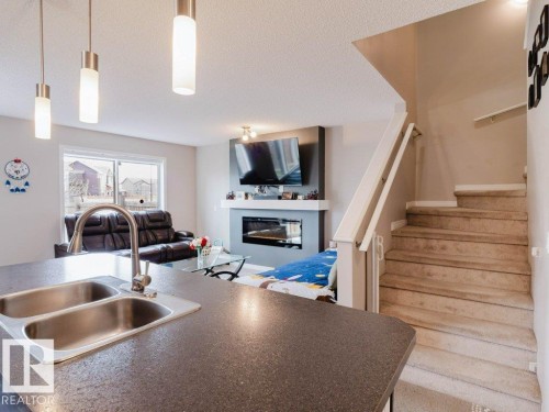 7607 24 Avenue, Edmonton, AB - Indoor With Fireplace