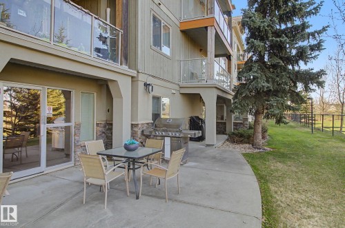 Ground-level patio with concrete surfacing - 204 278 Suder Greens Drive, Edmonton, AB - Outdoor With Balcony