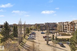 Multi-story residential buildings featuring gabled roofs and individual balconies - 