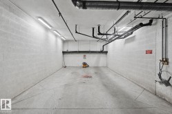 Concrete block walls featuring exposed conduit - 
