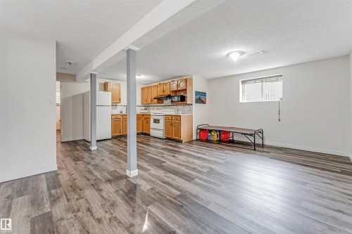 Open concept living area featuring wood-finish flooring - 1529 49A Street Nw, Edmonton, AB - Indoor