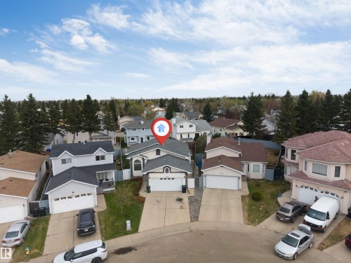Single-family residence with a two-car garage and a paved driveway - 1529 49A Street Nw, Edmonton, AB - Outdoor