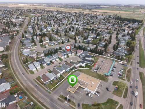 Aerial overview of a residential neighborhood featuring established homes with mature landscaping - 1529 49A Street Nw, Edmonton, AB -  With View
