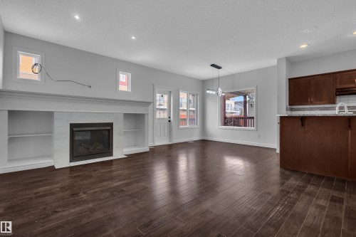 1303 29 Street Nw, Edmonton, AB - Indoor Photo Showing Living Room With Fireplace