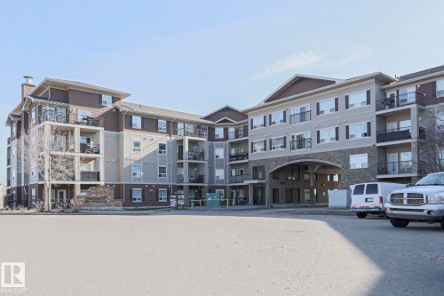 Multi-story building featuring a stone facade and balconies - 201 1520 Hammond Gate Gate, Edmonton, AB 