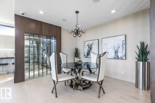 Dining Room featuring Two Sided Glass Wind Display - 5536 Chegwin Point(E), Edmonton, AB - Indoor Photo Showing Dining Room