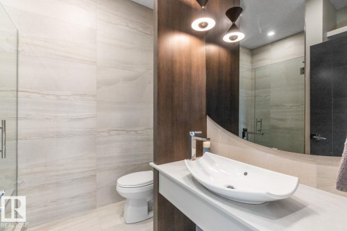 Main Floor 3 Piece Bathroom featuring Glass Shower and Vanity with Granite Countertops - 5536 Chegwin Point(E), Edmonton, AB - Indoor Photo Showing Bathroom