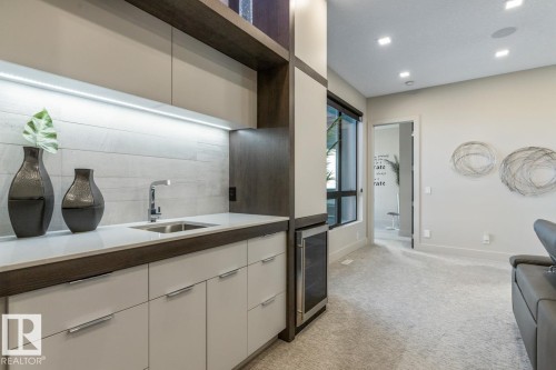 Upstairs Family room featuring ample Activity Space, and Wet Bar - 5536 Chegwin Point(E), Edmonton, AB - Indoor Photo Showing Kitchen