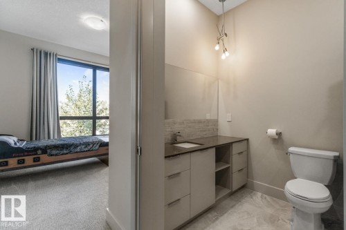 Upstairs Bedroom featuring Walk in Closet, Private Ensuite, and South West Facing Windows - 5536 Chegwin Point(E), Edmonton, AB - Indoor Photo Showing Bathroom