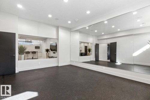 Dedicated Basement Gym Space with Rubber Flooring - 5536 Chegwin Point(E), Edmonton, AB - Indoor Photo Showing Other Room
