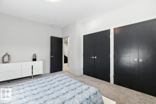 Basement Bedroom featuring ample closet space - 5536 Chegwin Point(E), Edmonton, AB - Indoor Photo Showing Bedroom