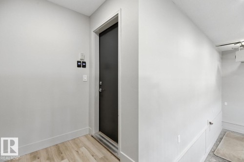 Entrance from the Garage to the Living Space - 5536 Chegwin Point(E), Edmonton, AB - Indoor Photo Showing Other Room