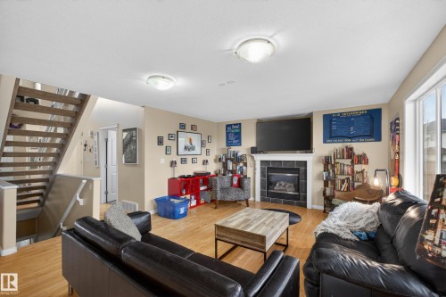 4333 Mcmullen Way Sw, Edmonton, AB - Indoor Photo Showing Living Room With Fireplace