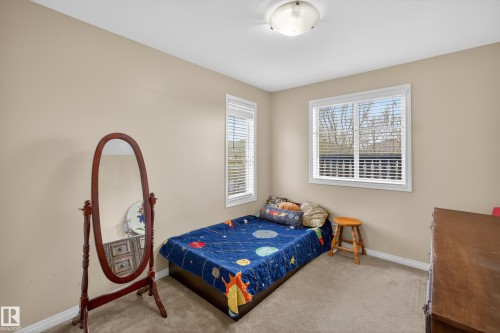 4333 Mcmullen Way Sw, Edmonton, AB - Indoor Photo Showing Bedroom