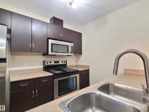 432 1180 Hyndman Road, Edmonton, AB - Indoor Photo Showing Kitchen With Double Sink