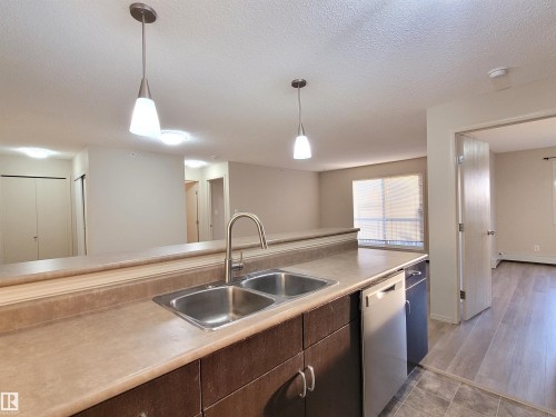 432 1180 Hyndman Road, Edmonton, AB - Indoor Photo Showing Kitchen With Double Sink