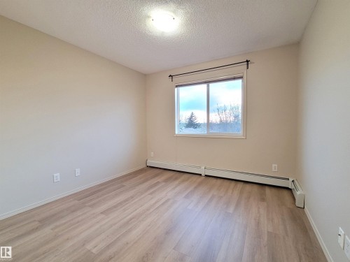 432 1180 Hyndman Road, Edmonton, AB - Indoor Photo Showing Other Room