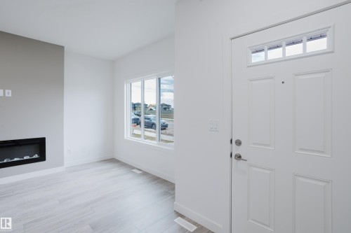 772 Mattson Drive, Edmonton, AB - Indoor Photo Showing Other Room With Fireplace