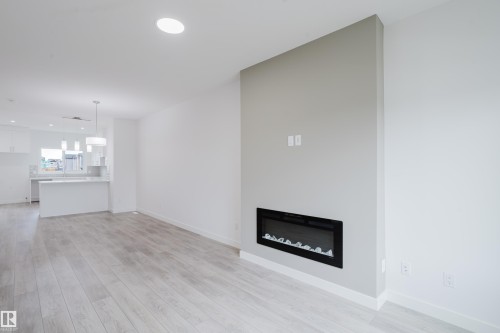 772 Mattson Drive, Edmonton, AB - Indoor Photo Showing Living Room With Fireplace