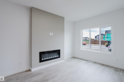 772 Mattson Drive, Edmonton, AB - Indoor Photo Showing Living Room With Fireplace