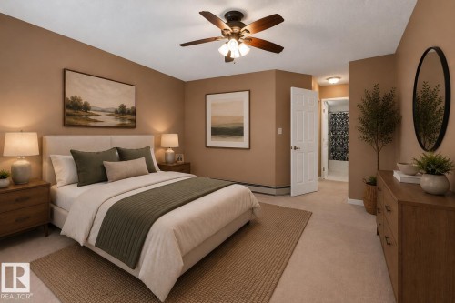 Plush carpeting throughout with a ceiling fan light fixture - 104 9760 174 Street, Edmonton, AB - Indoor Photo Showing Bedroom